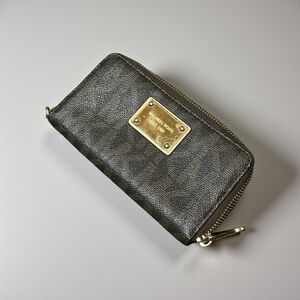 Michael Kors Textured Black Bag with Gold Plate